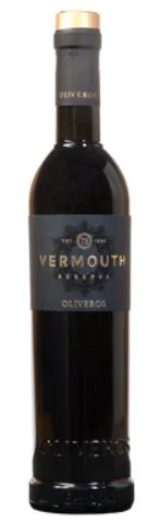 Botella de Vermut Oliveros Reserva, etiqueta gris oscura con emblema Est. 1940 y leyenda Vermouth Reserva